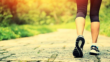 Woman running on a trail