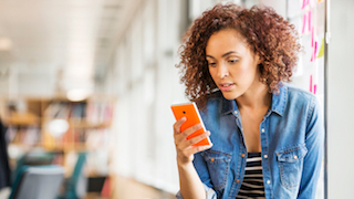 Woman reading on her phone