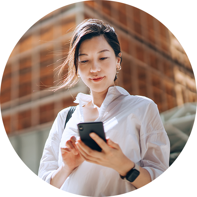 A woman looking at her phone.